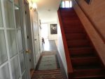 Stairs to the Master suite and entrance hallway